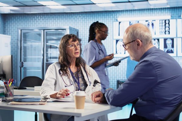 Medical sales representative meeting with a physician